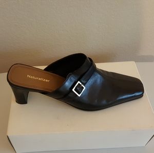 Black heeled slip ons